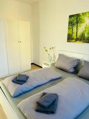 Ein Bett oder Betten in einem Zimmer der Unterkunft entzückende Ferienwohnung im Zentrum von Plauen
