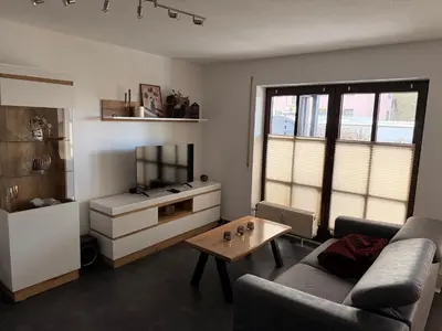 Ein Sitzbereich in der Unterkunft Komfortable moderne Ferienwohnung 43 qm