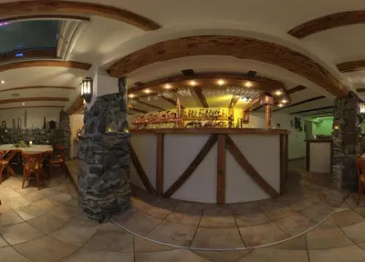 Ein Restaurant oder anderes Speiselokal in der Unterkunft Hotel Alpenhof