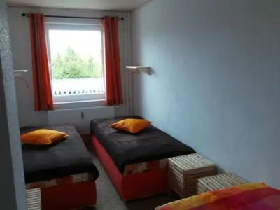 Ein Bett oder Betten in einem Zimmer der Unterkunft Apartment Fewo Hirschkopf by Interhome