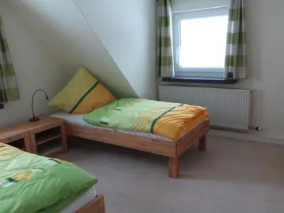Ein Bett oder Betten in einem Zimmer der Unterkunft Apartment Fewo Am Skihang OG by Interhome