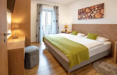 Ein Bett oder Betten in einem Zimmer der Unterkunft Ferienwohnungen Kiesenberg