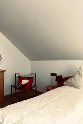 Ein Bett oder Betten in einem Zimmer der Unterkunft Pension Lutter