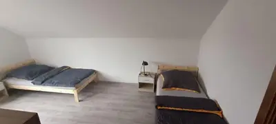 Ein Bett oder Betten in einem Zimmer der Unterkunft Monteurzimmer Thorsten Voit
