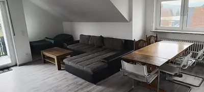 Ein Sitzbereich in der Unterkunft Monteurzimmer Thorsten Voit