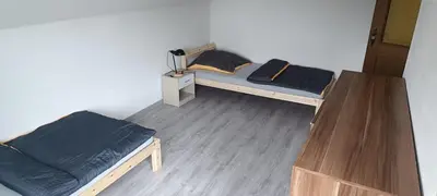 Ein Bett oder Betten in einem Zimmer der Unterkunft Monteurzimmer Thorsten Voit
