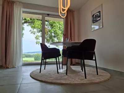 Ein Sitzbereich in der Unterkunft Neu renoviertes Studio mit Traumaussicht & Natur pur