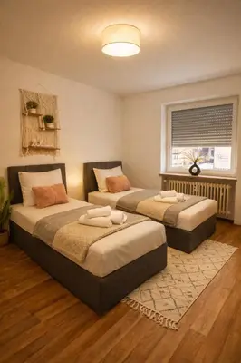 Ein Bett oder Betten in einem Zimmer der Unterkunft Urban Exit an der A93, ZENTRAL, NEU, WLAN
