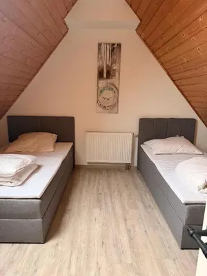Ein Bett oder Betten in einem Zimmer der Unterkunft Zentrale Erbendorfer Studiowohnung