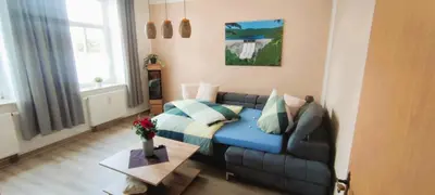 Ein Sitzbereich in der Unterkunft 65m² Ferienwohnung zwischen Skiarena & Saunawelt
