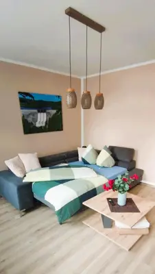 Ein Sitzbereich in der Unterkunft 65m² Ferienwohnung zwischen Skiarena & Saunawelt