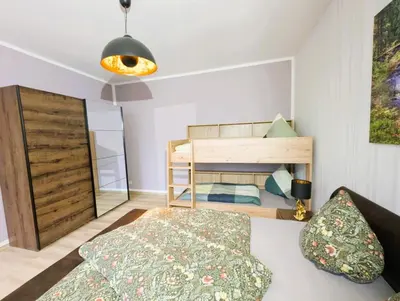 Ein Bett oder Betten in einem Zimmer der Unterkunft 65m² Ferienwohnung zwischen Skiarena & Saunawelt
