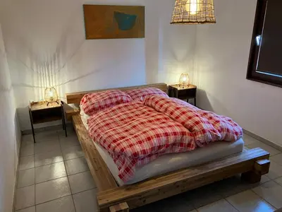 Ein Bett oder Betten in einem Zimmer der Unterkunft Juragarden