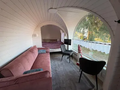 Ein Sitzbereich in der Unterkunft Seeperle Weißenstadt Haus Waldstein