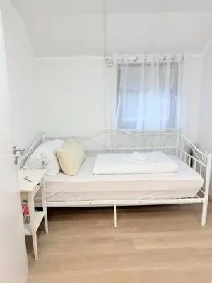 Ein Bett oder Betten in einem Zimmer der Unterkunft Fichtenblick