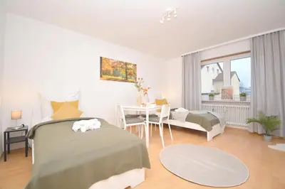 Ein Bett oder Betten in einem Zimmer der Unterkunft Kulmbach 02 - Apartment für Firmen