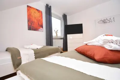 Ein Bett oder Betten in einem Zimmer der Unterkunft Kulmbach 03 - Apartment für Firmen