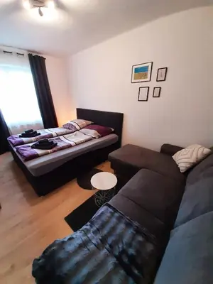 Ein Bett oder Betten in einem Zimmer der Unterkunft Heubi 6 Appartment 2 Schlafzimmer