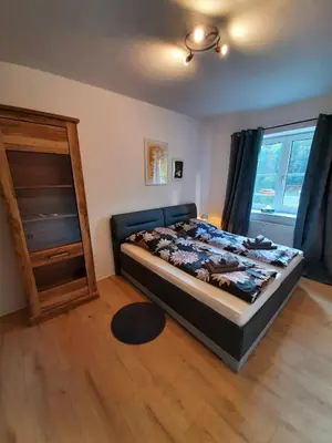Ein Bett oder Betten in einem Zimmer der Unterkunft Heubi 6 Appartment 2 Schlafzimmer