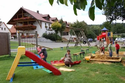 Ein Kinderspielbereich in der Unterkunft Kollerhof