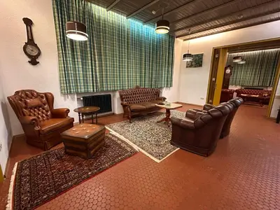 Ein Sitzbereich in der Unterkunft Villa Vanel - Pension Hotel