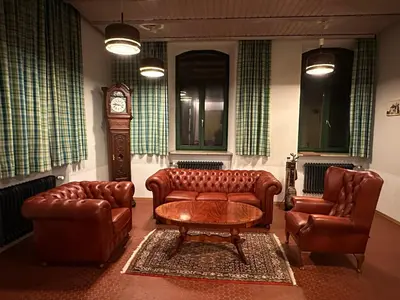 Ein Sitzbereich in der Unterkunft Villa Vanel - Pension Hotel