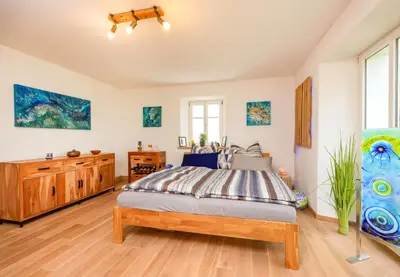 Ein Bett oder Betten in einem Zimmer der Unterkunft Die Blaue Pause 29