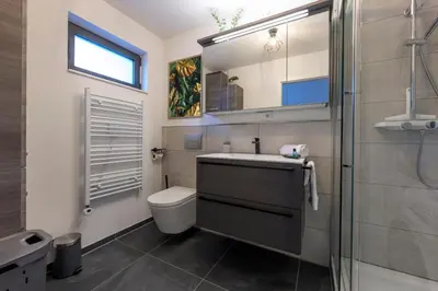 Ein Badezimmer in der Unterkunft Das Chalet