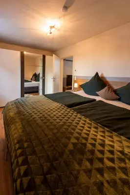 Ein Bett oder Betten in einem Zimmer der Unterkunft Das Chalet