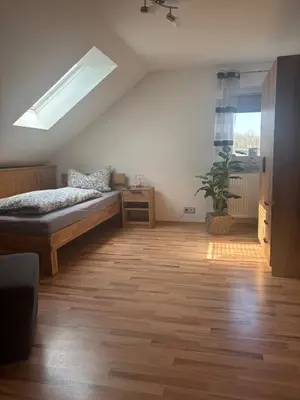 Ein Bett oder Betten in einem Zimmer der Unterkunft Ferienwohnung Schaller