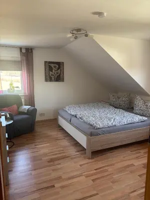Ein Bett oder Betten in einem Zimmer der Unterkunft Ferienwohnung Schaller