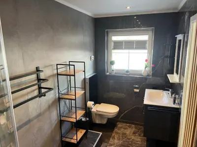 Ein Badezimmer in der Unterkunft Fichtelrooms
