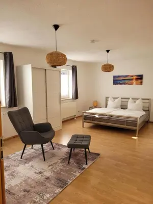 Ein Bett oder Betten in einem Zimmer der Unterkunft NEU! Ferienwohnung Wunsiedel OG