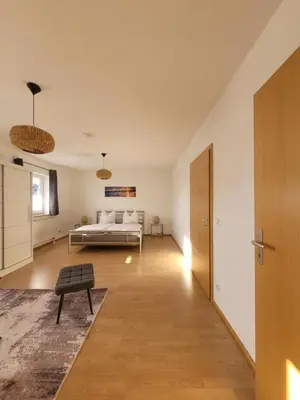 Ein Bett oder Betten in einem Zimmer der Unterkunft NEU! Ferienwohnung Wunsiedel OG