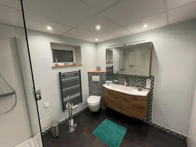 Ein Badezimmer in der Unterkunft Ferienwohnung mit Garten und Sauna, nahe Bayreuth