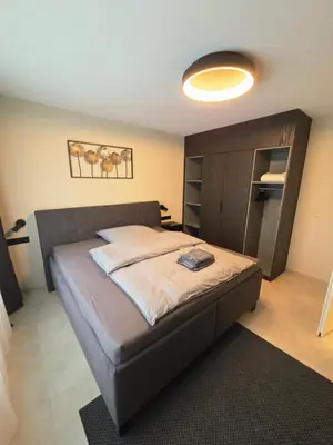 Ein Bett oder Betten in einem Zimmer der Unterkunft Pension Sleep&Stay Hersbruck