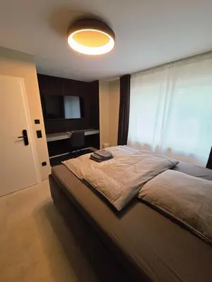Ein Bett oder Betten in einem Zimmer der Unterkunft Pension Sleep&Stay Hersbruck