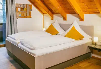 Ein Bett oder Betten in einem Zimmer der Unterkunft Ferienholzhaus Füßmann im Ahorntal