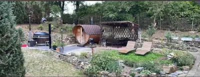 Ein Garten an der Unterkunft Ferienhaus Vogtland mit Sauna und Hot Tub