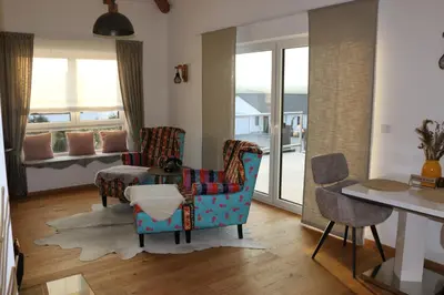 Ein Sitzbereich in der Unterkunft Regentaloase - Deine Privat-Spa Villa für Zwei