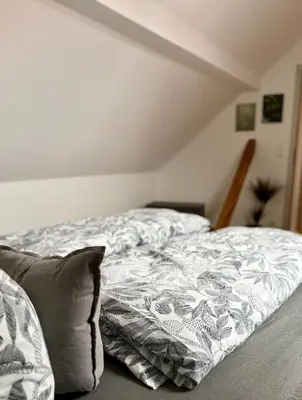 Ein Bett oder Betten in einem Zimmer der Unterkunft Dachblick by Zirwick Apartment