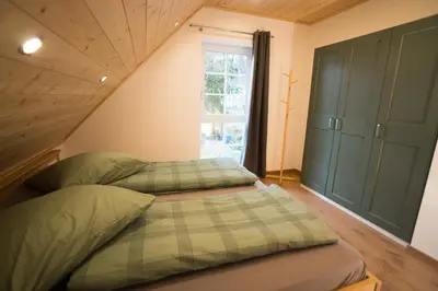 Ein Bett oder Betten in einem Zimmer der Unterkunft Ferienhaus Theresa