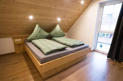 Ein Bett oder Betten in einem Zimmer der Unterkunft Ferienhaus Theresa
