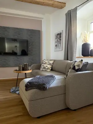 Ein Sitzbereich in der Unterkunft Wohnzeit by Zirwick Apartment