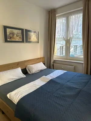 Ein Bett oder Betten in einem Zimmer der Unterkunft Im Herzen Plauen