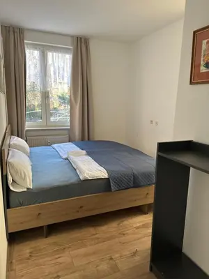 Ein Bett oder Betten in einem Zimmer der Unterkunft Im Herzen Plauen