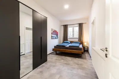 Ein Bett oder Betten in einem Zimmer der Unterkunft Modernes Apartment in Mistelgau 3