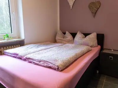 Ein Bett oder Betten in einem Zimmer der Unterkunft Apartment im ersten Obergeschoss by Interhome