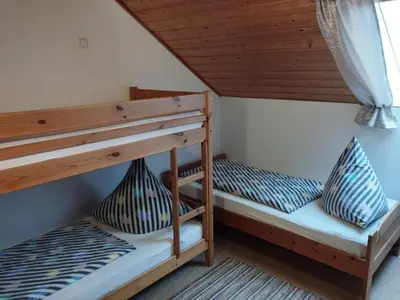 Ein Bett oder Betten in einem Zimmer der Unterkunft Apartment Sunset by Interhome