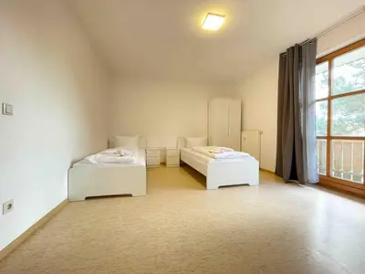 Ein Bett oder Betten in einem Zimmer der Unterkunft Apartment STA1115 by Interhome